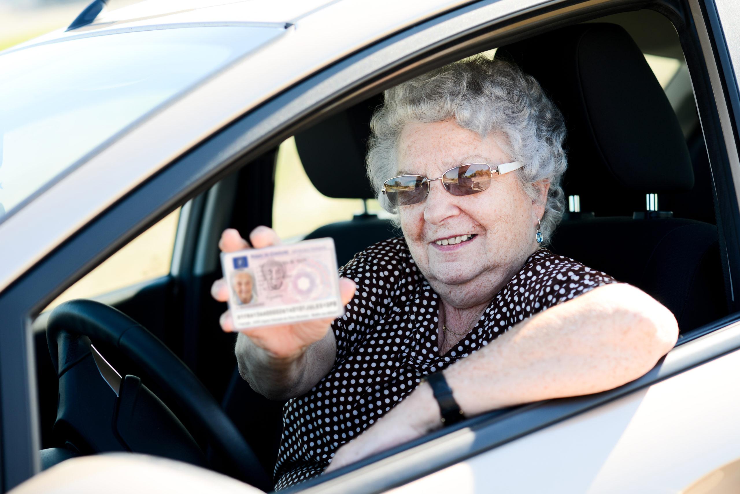 Grandma is driving. Old woman Driving. Old man Driving.