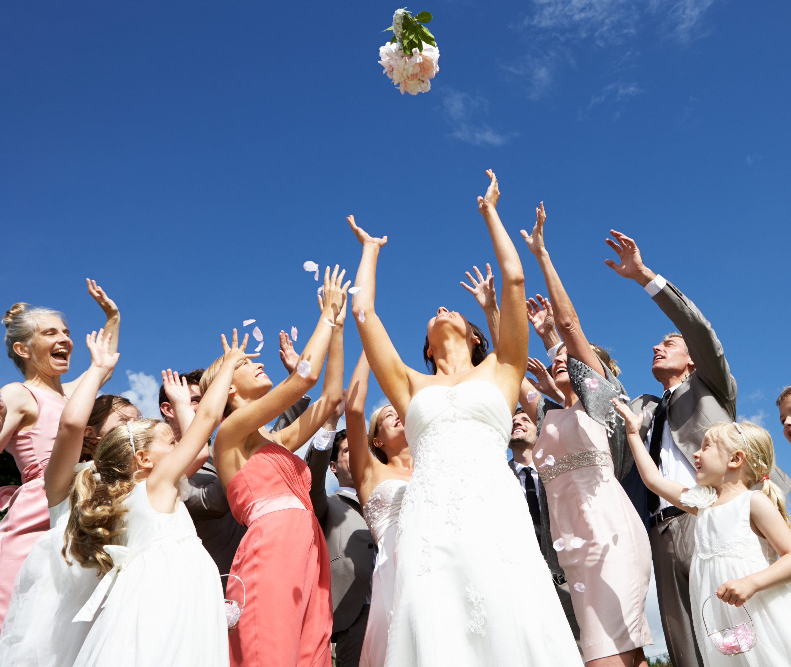 hunger Games?  One woman nearly breaks another’s arm to pick up the bouquet