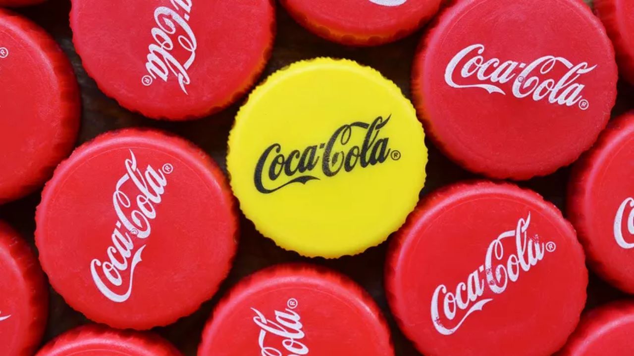Why does Coca-Cola have a yellow cap?